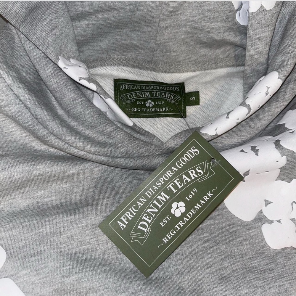 Grey and white denim tears hoodie
